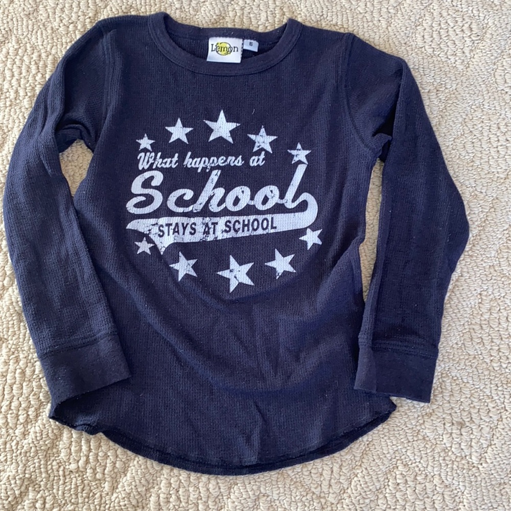 What happens at school stays at school waffle shirt